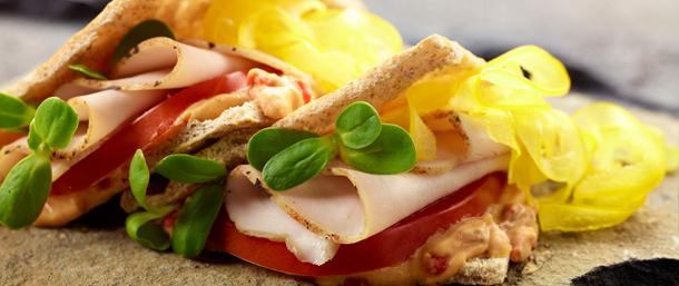 Roasted Red Pepper Hummus and Ovengold Turkey Pita Sandwich