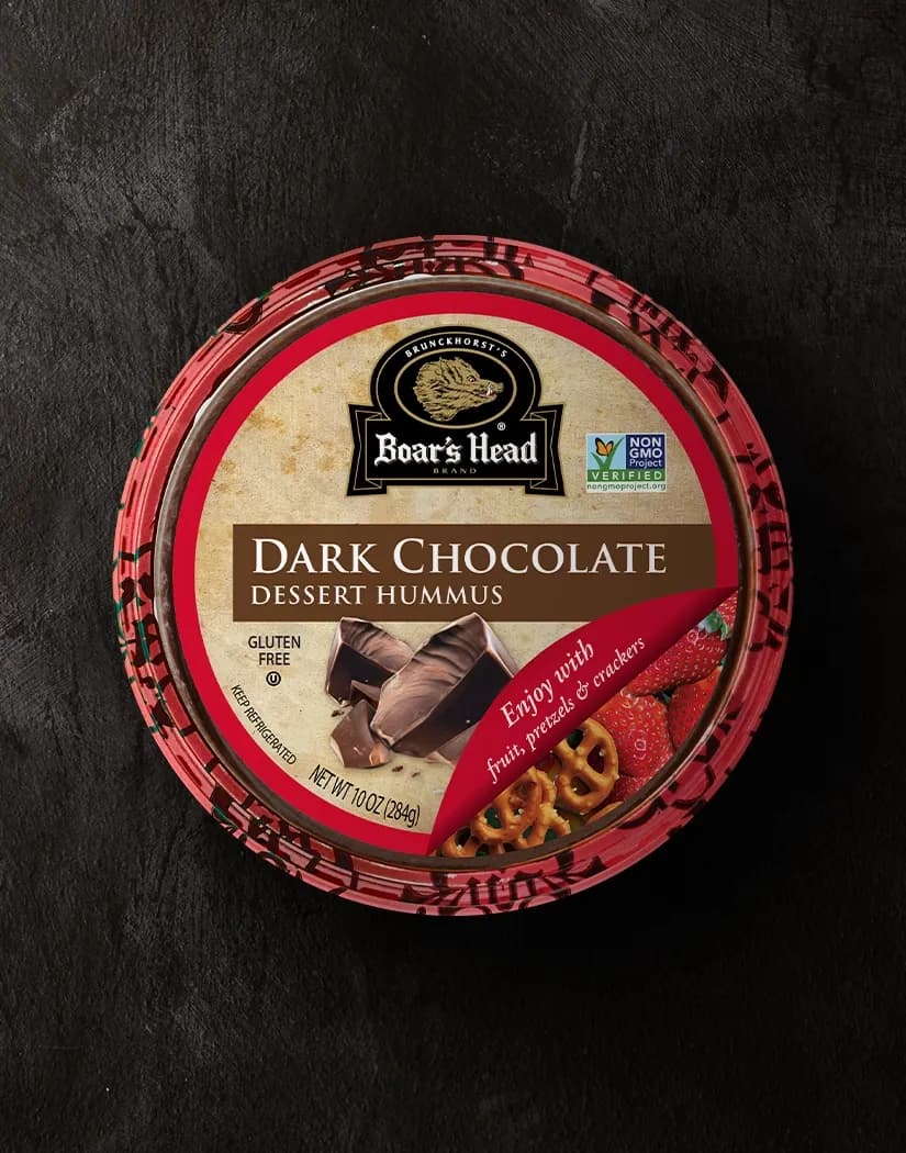 An aerial view of the Boar's Head® Dark Chocolate Hummus that sits on a graphite colored background.